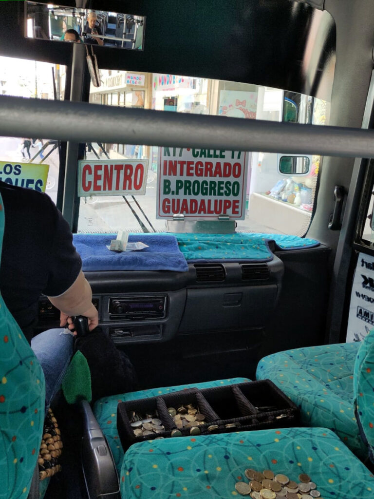 Cash-payment system inside a buseta (city bus) in Duitama, Colombia 